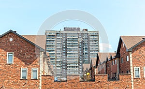 Expensive modern townhouses and an apartment building