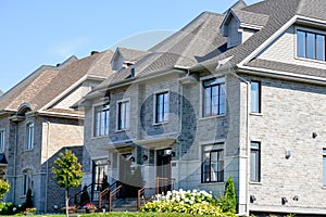 Expensive modern townhouses with huge windows