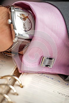 Expensive watch on a businessman`s hand