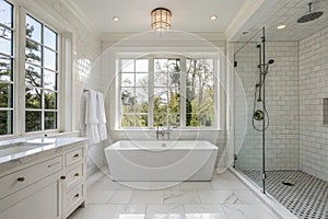 Expensive white bathroom with large rectangular bathtub
