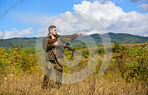 Experience and practice lends success hunting. Guy hunting nature environment. Hunting weapon gun or rifle. Masculine