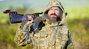 Experience and practice lends success hunting. Hunting season. Guy hunting nature environment. Bearded hunter rifle