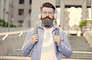 Experience relaxing mood with zen sound. Bearded man listen to music with closed eyes. Meditation sound. Hi-Fi stereo