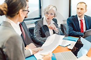 Experienced attorney with her team of professionals working