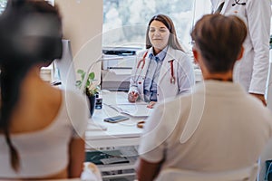 Experienced Doctor Checking Eyesight in Hospital Exam Room