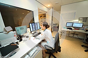 Experienced doctor looking at MRI scan of lumbar