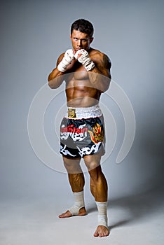 An experienced fighter kickboxer ready for a fight