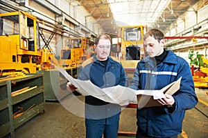 Experienced industrial assembler workers photo