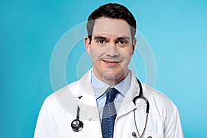 Experienced male doctor posing