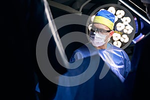 Experienced surgeon at the workplace in the operating room