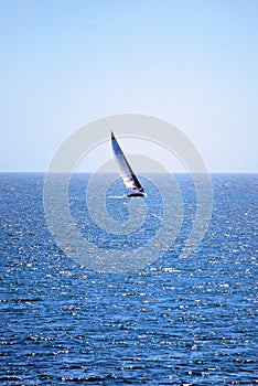 Experimental sailing hydrofoil trimaran on the sea