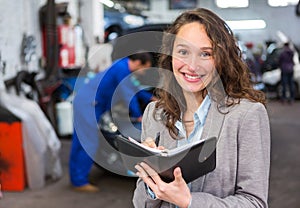 Expert in autobile working in a garage