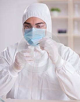 Expert criminologist working in the lab for evidence