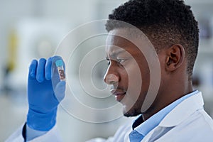 Expert, laboratory and black man with vial, blood and pharmaceuticals with experiment and forensic with science. Person