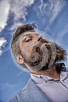 Expert tips for growing moustache. Man bearded hipster with mustache sky background. Check out my long beard. Ultimate