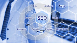 IT expert touches grid with seo keywords