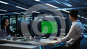 Expert updating server room systems using green screen computer