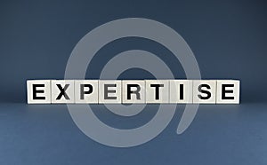Expertise. Cubes form the word Expertise