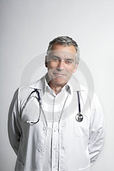 Expertise doctor senior gray hair smiling portrait