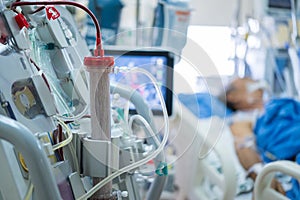 Experts are preparing a dialysis machine photo