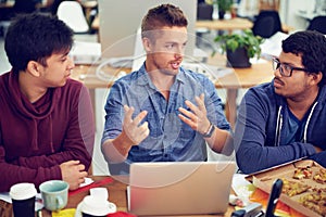 The IT experts. Shot of employees in an IT office.