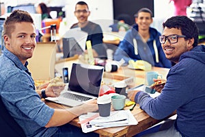 The IT experts. Shot of employees in an IT office.