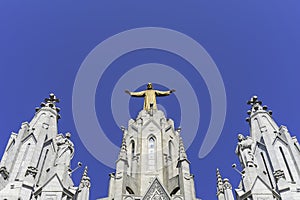 The Expiatory Temple of the Sacred Heart in Barcelona, Spain. With a classic blue sky. photo