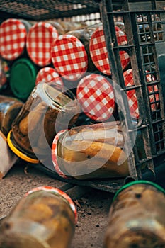 Expired homemade pickled cucumbers in jar thrown away