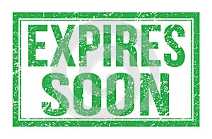 EXPIRES SOON, words on green rectangle stamp sign photo