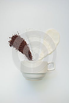 Explained hot coffee ratio Ingredients mix isolated white background. Coffee, Sugar, Creamer photo