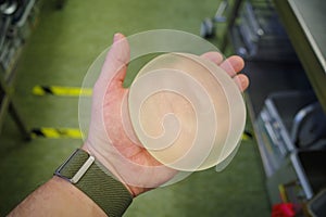 an explanted silicone breast implant