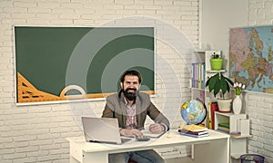Explore something new. pass the exam. learning the subject. happy man with beard work on computer. studying online