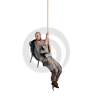 Explorer hanging from a rope