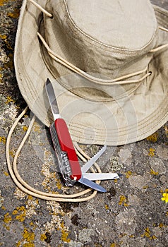 Explorer hat and swiss army knife