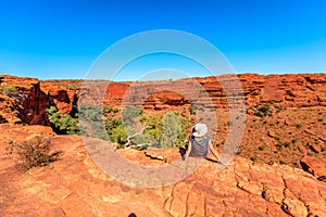 explorer Woman with hat at Kings Canyon Australia