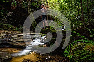 Exploring lush green gullys with flowing mountain streams