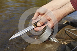 Exploring of river with magnet on rope and finding of knife