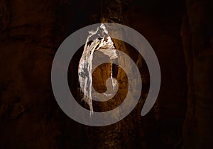 Exploring underground caves with stalactite and stalagmite growth