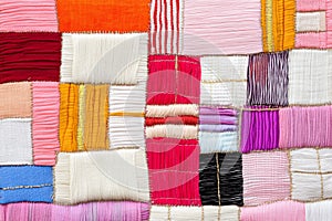 Exploring the vibrant textures and patterns of global textiles through abstract composition