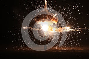 Explosion on the black background photo