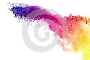 Explosion of colored powder, isolated on white background. Abstract of colored dust splatted. Color cloud.