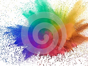 Explosion of colored powder on white background