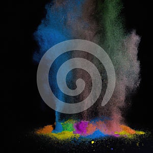 Explosion of colorful powder isolated on dark black background. Holi paint color dust explode in freeze motion. Generative AI