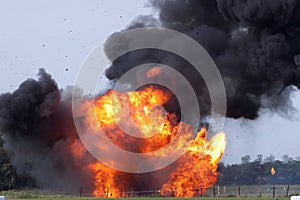 Explosion with flying debris photo