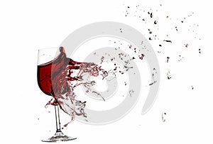 Explosion of a glass with red wine