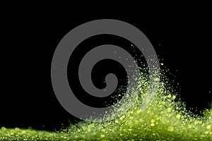 Explosion metallic green glitter sparkle. Green Glitter powder spark blink celebrate, blur foil explode in air, fly throw green