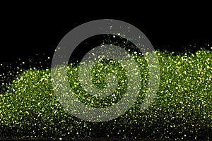 Explosion metallic green glitter sparkle. Green Glitter powder spark blink celebrate, blur foil explode in air, fly throw green