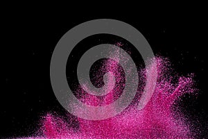 Explosion metallic pink glitter sparkle. Choky Glitter powder spark blink celebrate, blur foil explode in air, fly throw pink photo