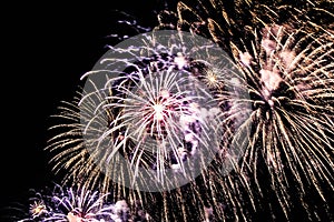 Explosion of multi-colored fireworks in Dubai against the night sky on a new year celebrations holidays