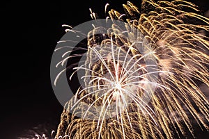 Explosion of multi-colored fireworks in Dubai against the night sky on a new year celebrations holidays